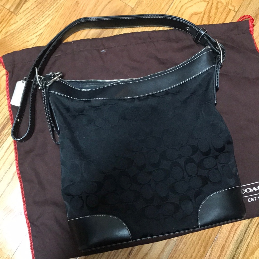 Coach purse black dust bag